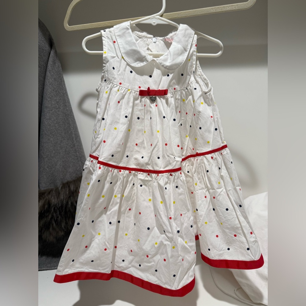 Polka Dot Sleeveless Dress with Red Accents